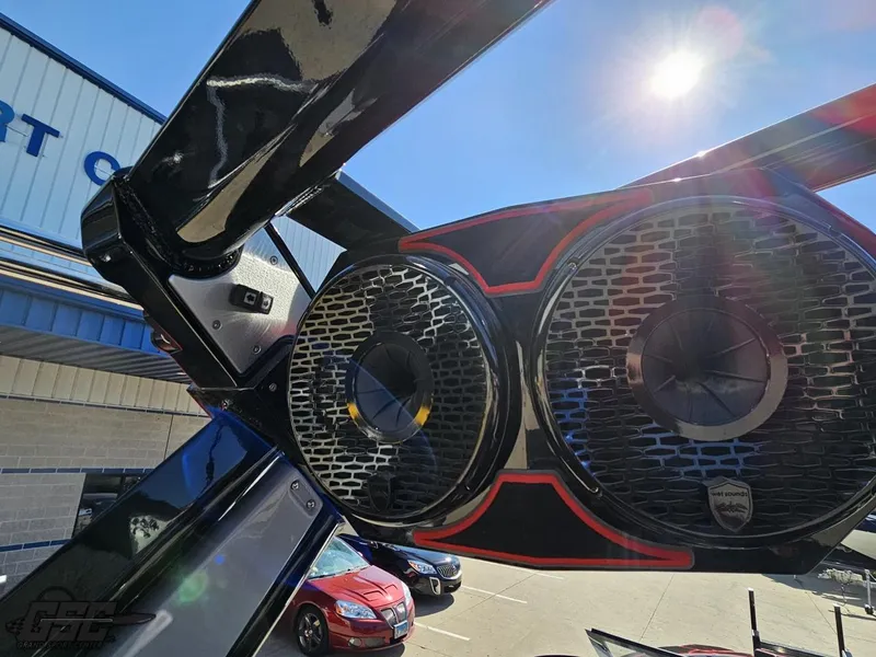 Slide: The Image of Close-up of 2021 Centurion Ri265 boat speakers under bright sunlight. - 38