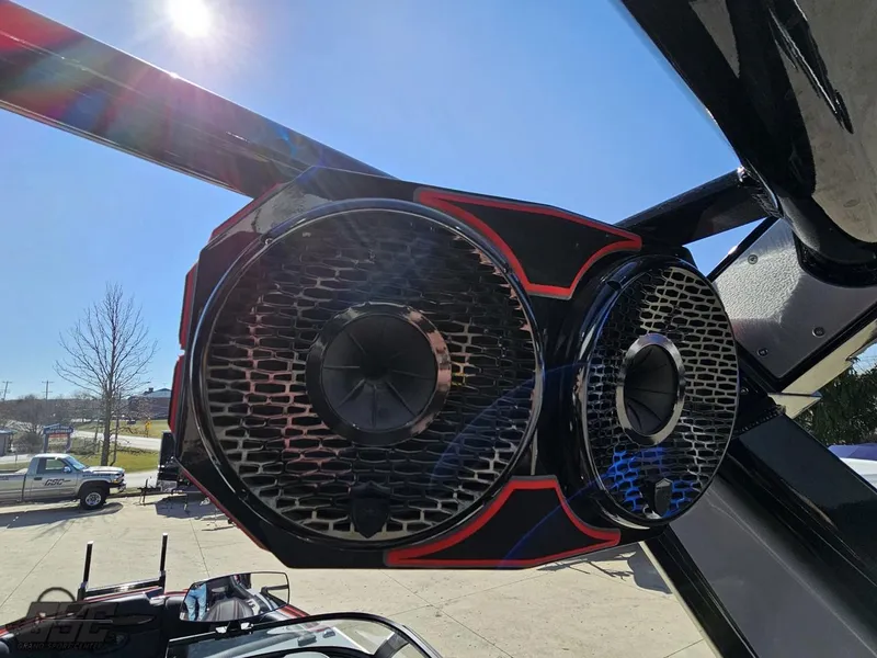 Slide: The Image of Close-up of 2021 Centurion Ri265 boat speakers under a clear blue sky. - 39
