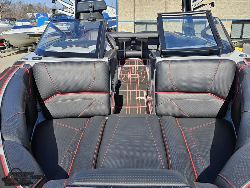 Slide: The Image of 2021 Centurion Ri265 boat interior with black and red upholstery. - 8