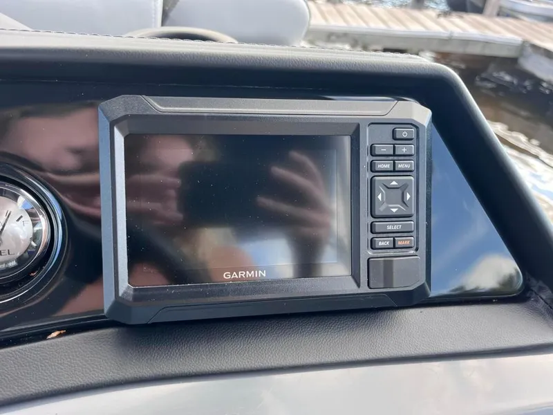 Slide: The Image of Garmin navigation system on 2024 Bennington 22SVL-SPS boat dashboard. - 25