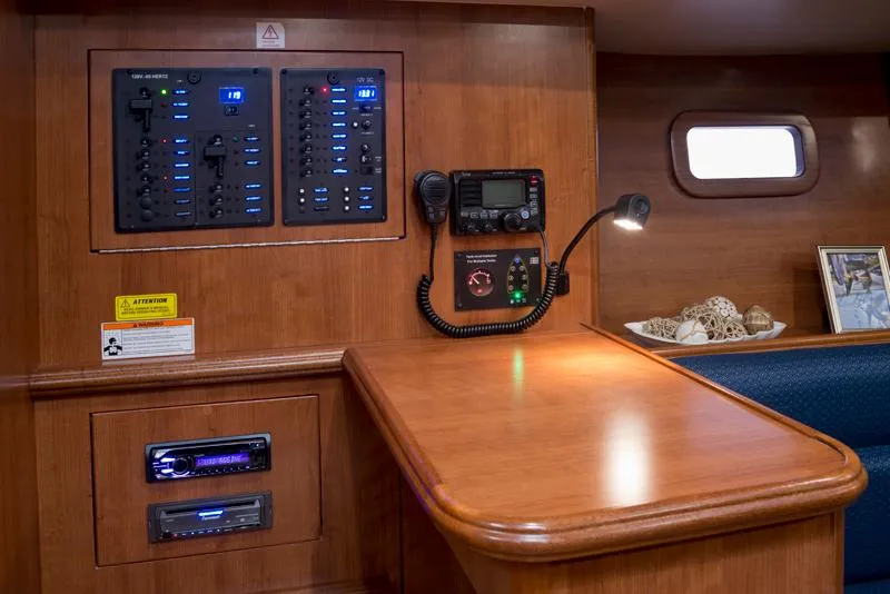 Slide: The Image of Control panel and navigation station inside a 2016 Marlow-Hunter 37 sailboat. - 19