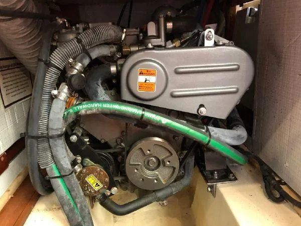 Slide: The Image of 2016 Marlow-Hunter 37 engine compartment with hoses and mechanical components. - 4