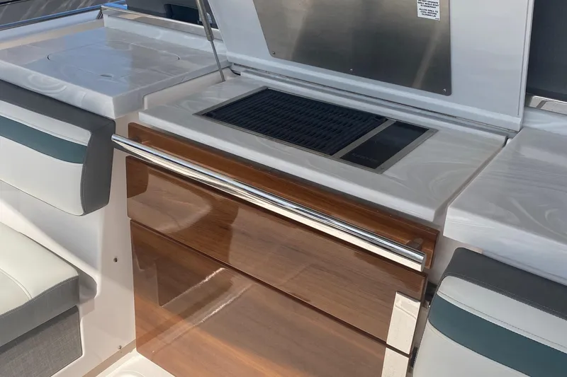 Slide: The Image of 2019 Tiara Sport 38 LS boat interior with sleek kitchen area. - 20