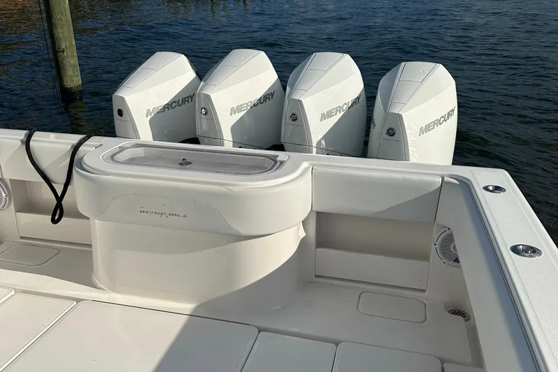 Slide: The Image of 2018 Invincible 39 Open Fisherman boat with four Mercury engines. - 2