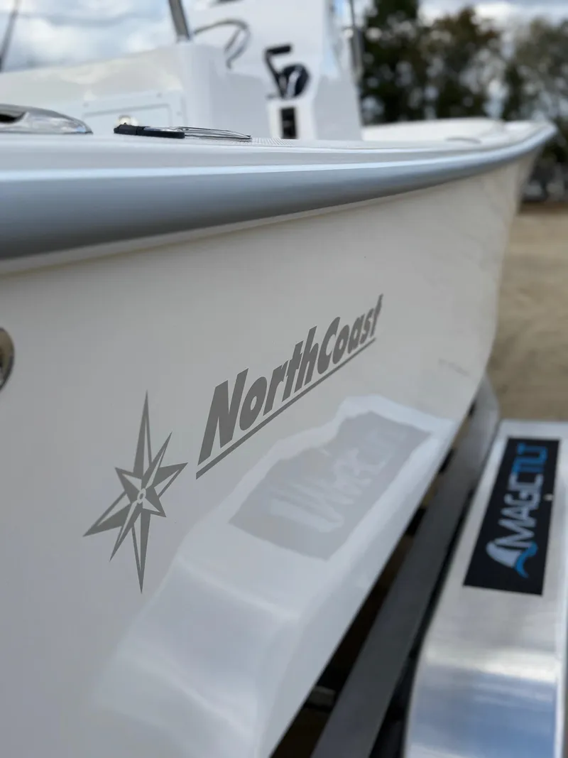 Slide: The Image of 2024 NorthCoast 190 boat side view with logo and compass design. - 9