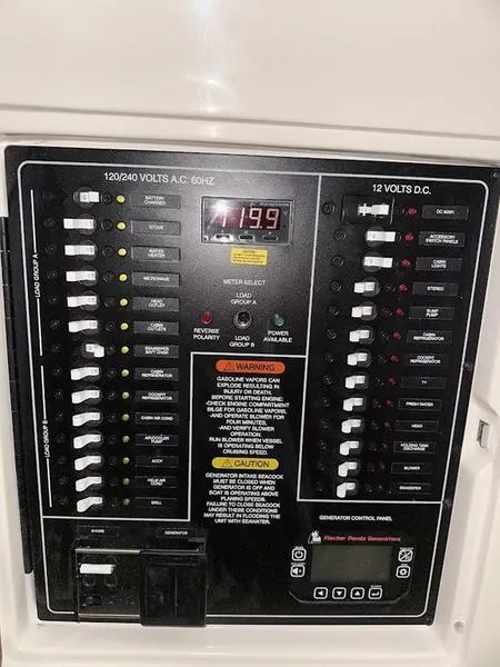 Slide: The Image of Electrical control panel of 2024 Grady-White Express 330 boat. - 18