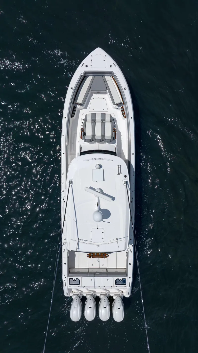 Slide: The Image of Aerial view of 2023 Everglades 455cc boat on water. - 12