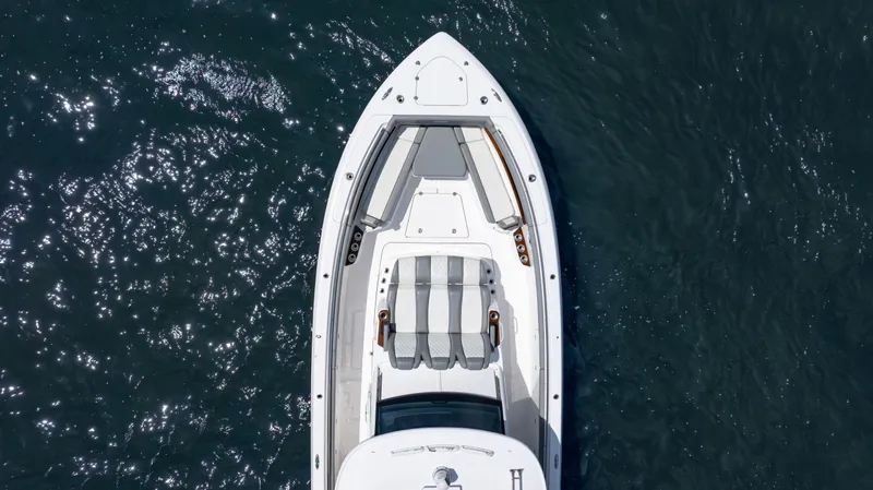 Slide: The Image of Aerial view of 2023 Everglades 455cc boat on water. - 13