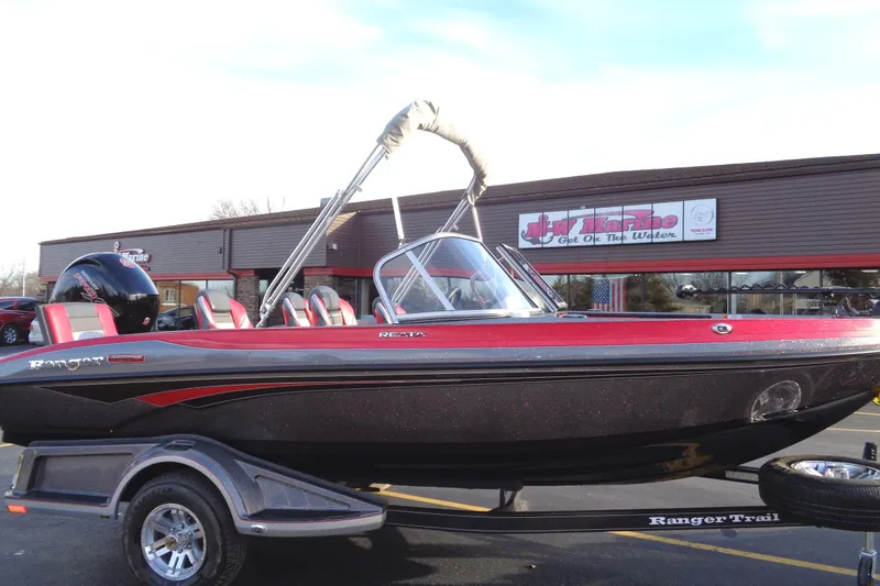 The Image of 2024 Ranger 1850 Reata boat on trailer, parked outside a dealership. - 0