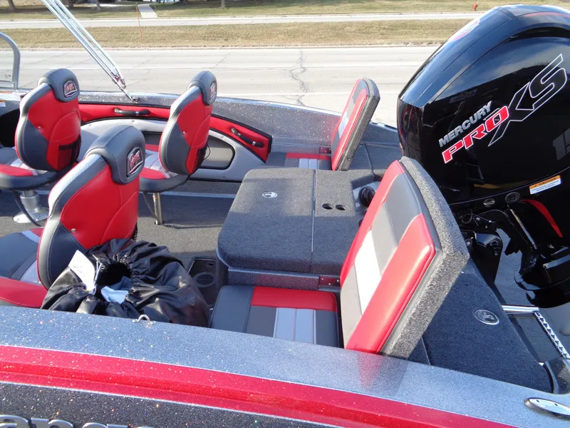 Slide: The Image of 2024 Ranger 1850 Reata boat interior with red and gray seats, Mercury Pro XS engine. - 5