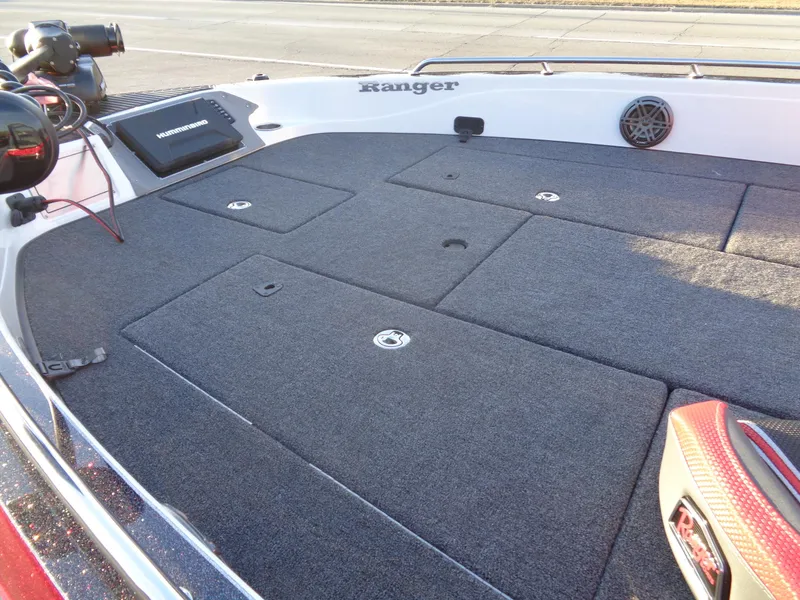 Slide: The Image of 2024 Ranger 621 FS PRO boat deck with storage compartments. - 17