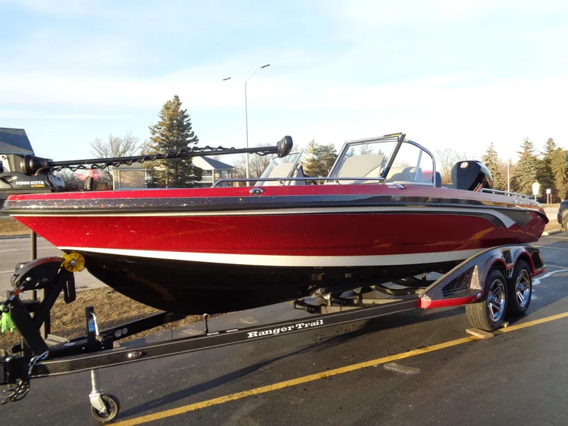 Slide: The Image of 2024 Ranger 621 FS PRO boat on trailer, red and black, side view. - 5