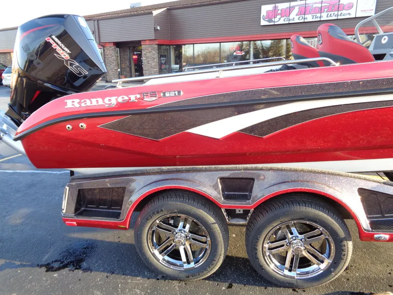Slide: The Image of 2024 Ranger 621 FS PRO boat with dual-axle trailer, red and black color scheme. - 8