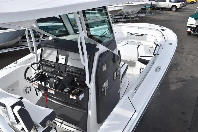Slide: The Image of 2024 Blackfin 272CC center console boat with advanced navigation system. - 13