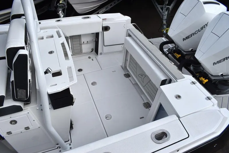 Slide: The Image of 2024 Blackfin 272CC boat interior with Mercury engines. - 14