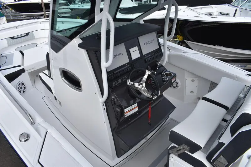 Slide: The Image of 2024 Blackfin 272CC center console boat with Garmin navigation system. - 15