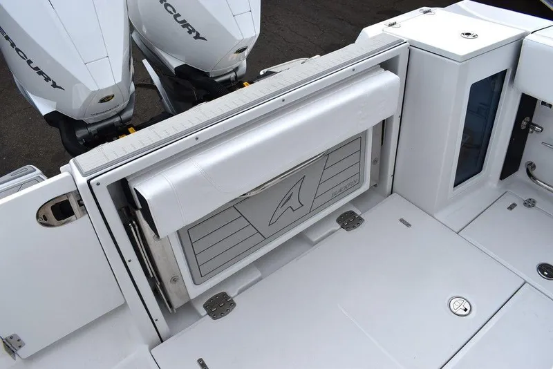 Slide: The Image of 2024 Blackfin 272CC boat with Mercury engines and foldable seating. - 35