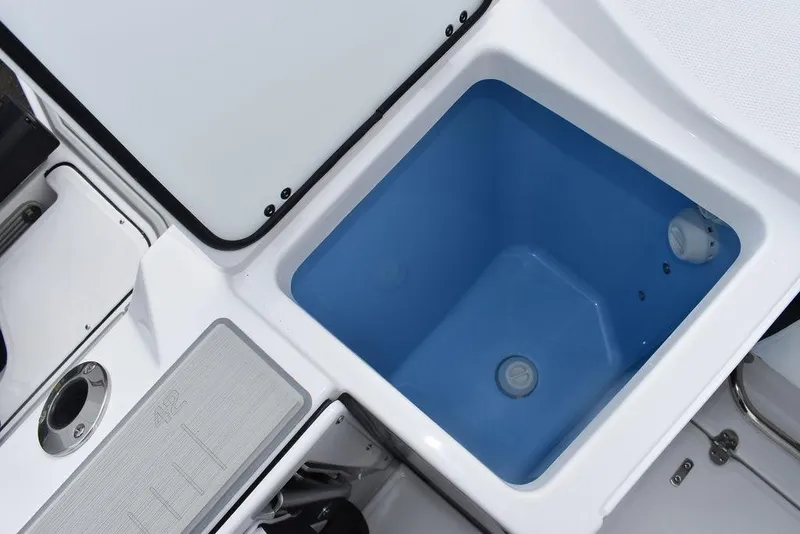 Slide: The Image of 2024 Blackfin 272CC boat livewell and storage compartment. - 43