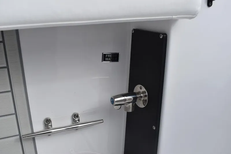 Slide: The Image of 2024 Blackfin 272CC fresh water faucet and stainless steel fixtures. - 45