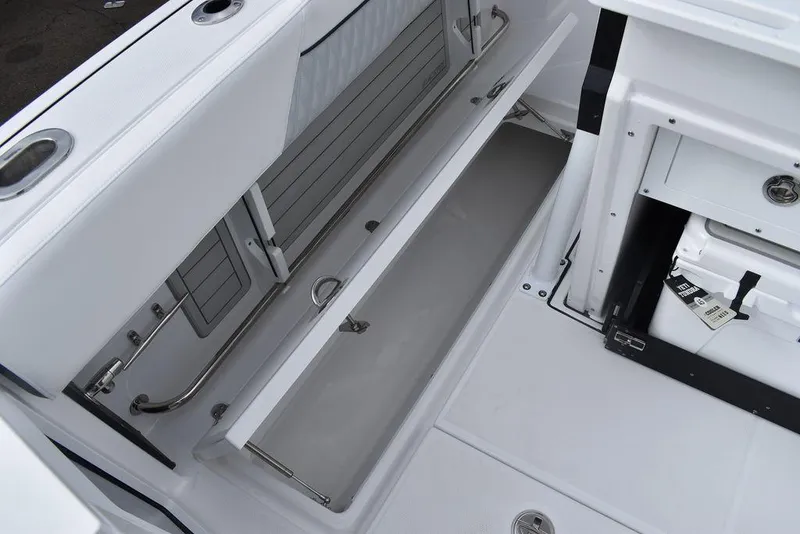 Slide: The Image of 2024 Blackfin 272CC boat interior storage compartment. - 46