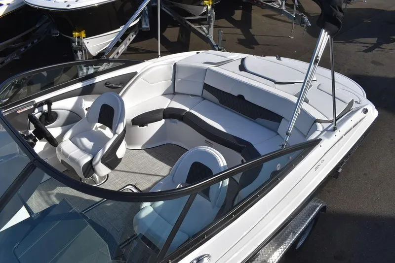 Slide: The Image of 2024 Monterey 224FS boat interior with white and black seating. - 14