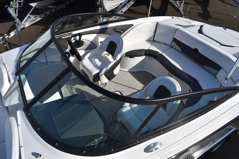 Slide: The Image of 2024 Monterey 224FS boat interior with white and black seating. - 15