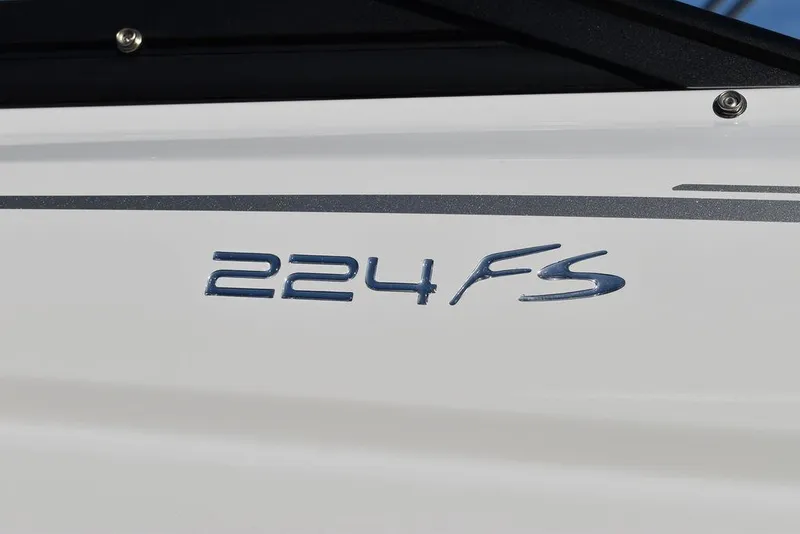 Slide: The Image of 2024 Monterey 224FS boat model emblem on white hull - 20