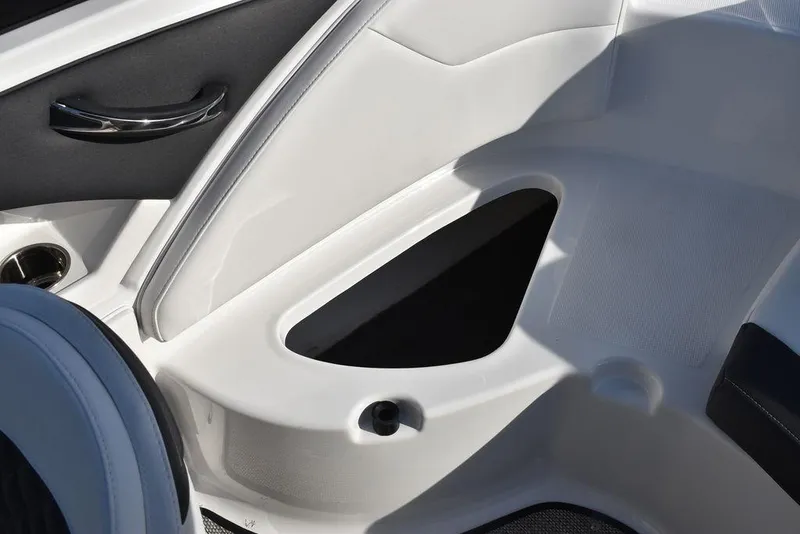 Slide: The Image of 2024 Monterey 224FS boat interior detail with storage compartment and sleek design. - 31