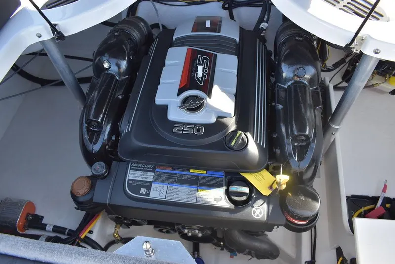 Slide: The Image of 2024 Monterey 224FS boat engine compartment with a powerful 250 HP Mercury engine. - 34