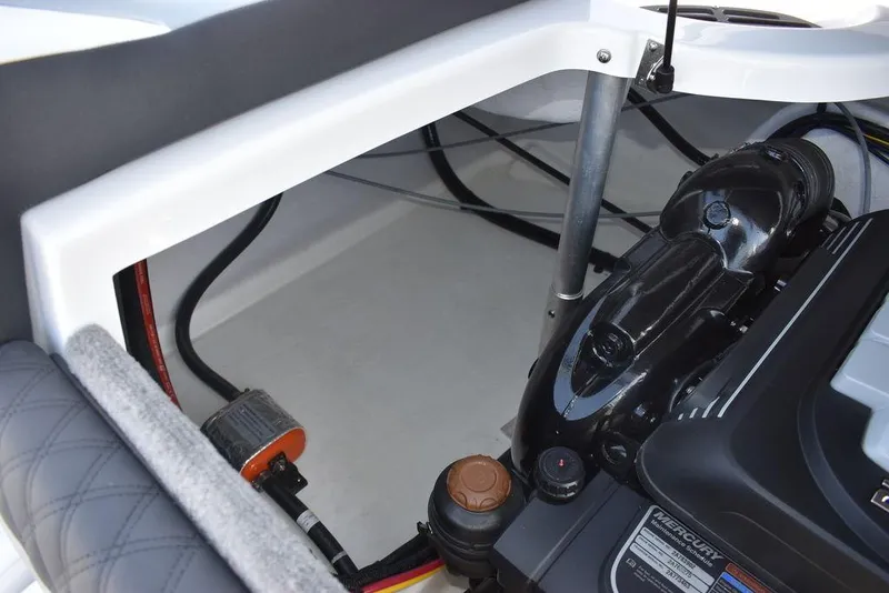 Slide: The Image of 2024 Monterey 224FS boat engine compartment with visible components. - 36