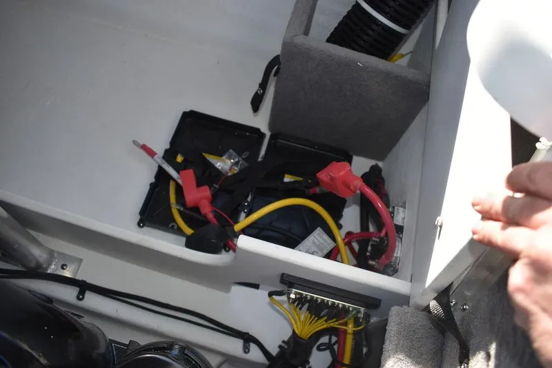 Slide: The Image of 2024 Monterey 224FS boat battery compartment with wiring and connections. - 38