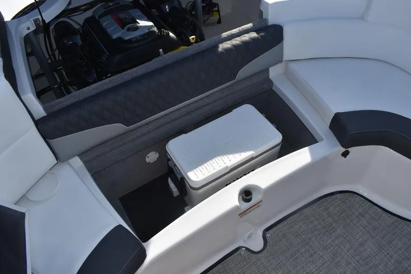 Slide: The Image of 2024 Monterey 224FS boat interior with engine compartment and storage area. - 40