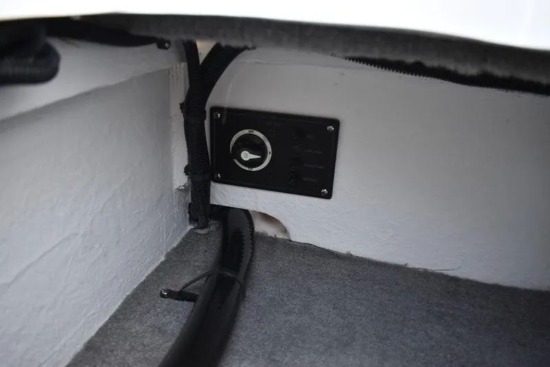 Slide: The Image of 2024 Monterey 224FS boat interior control panel and wiring. - 43