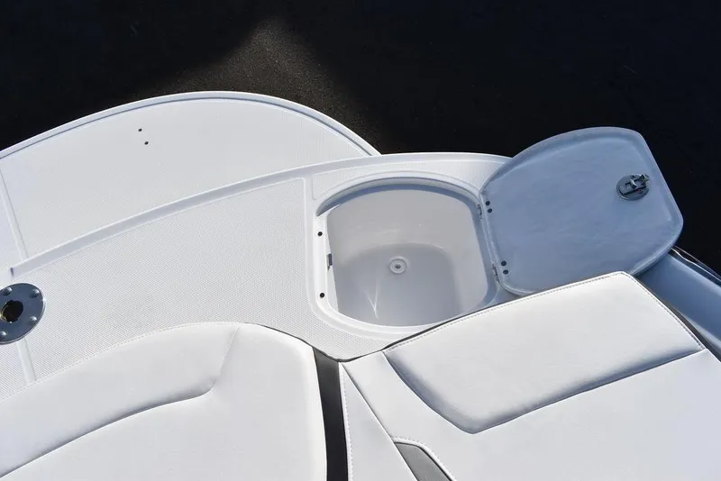 Slide: The Image of 2024 Monterey 224FS boat with open storage compartment on deck. - 44