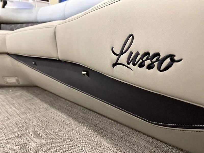 Slide: The Image of 2024 Barletta Lusso Ultra-Lounge L25U interior detail with embroidered logo. - 17