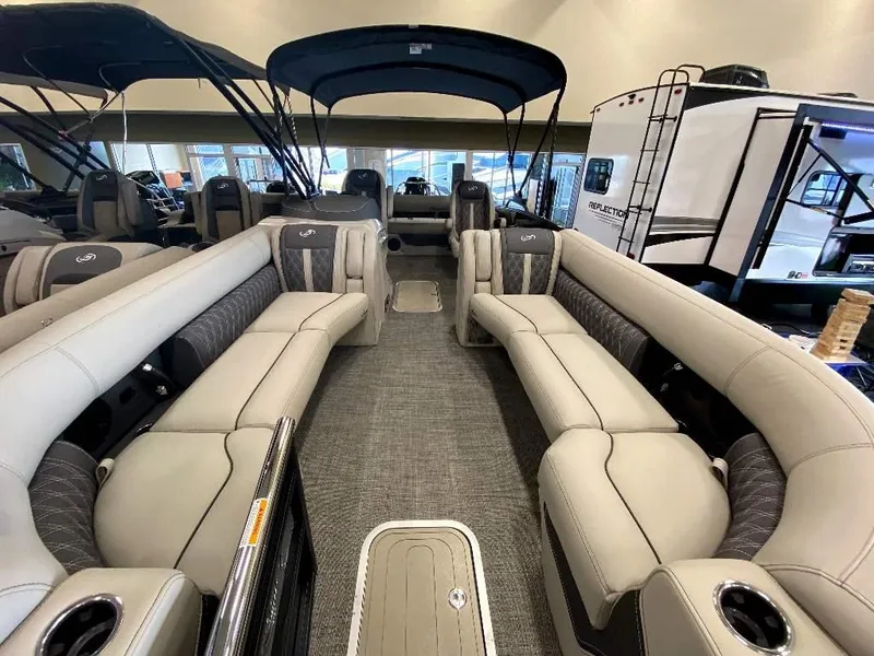 Slide: The Image of 2024 Barletta Lusso Ultra-Lounge L25U pontoon boat interior with luxurious seating. - 6