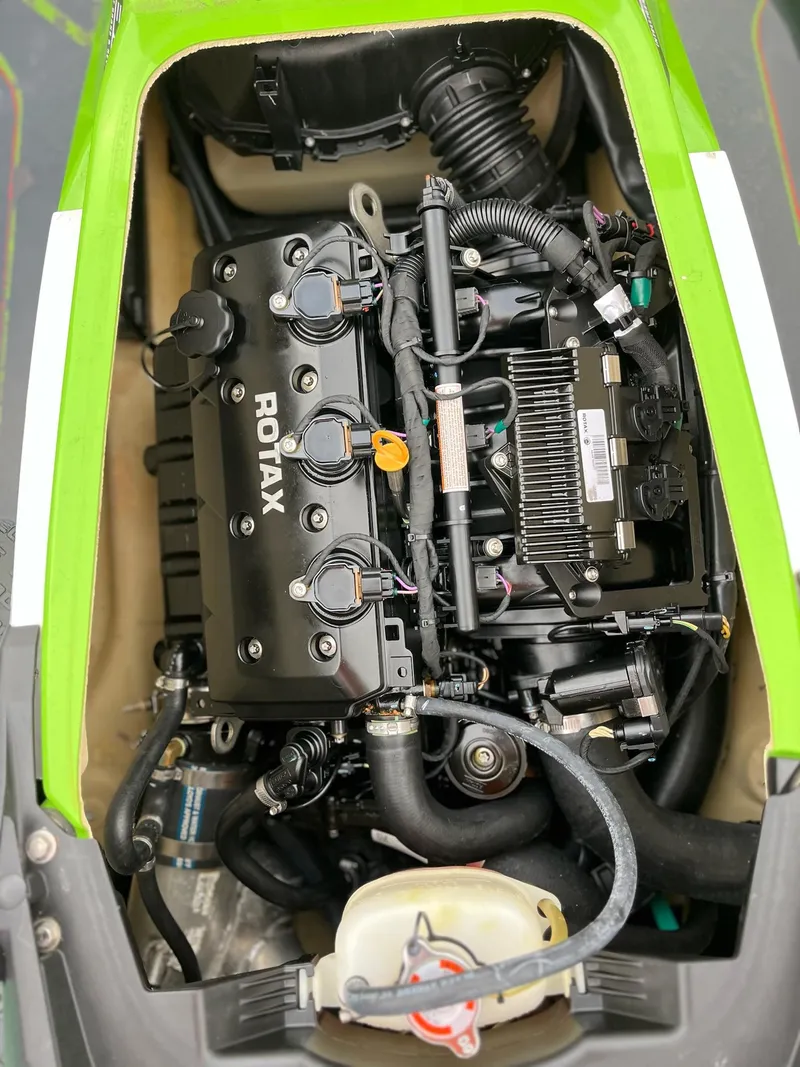 Slide: The Image of Engine compartment of a 2017 Bombardier Sea Doo GTR 230 with Rotax engine. - 27