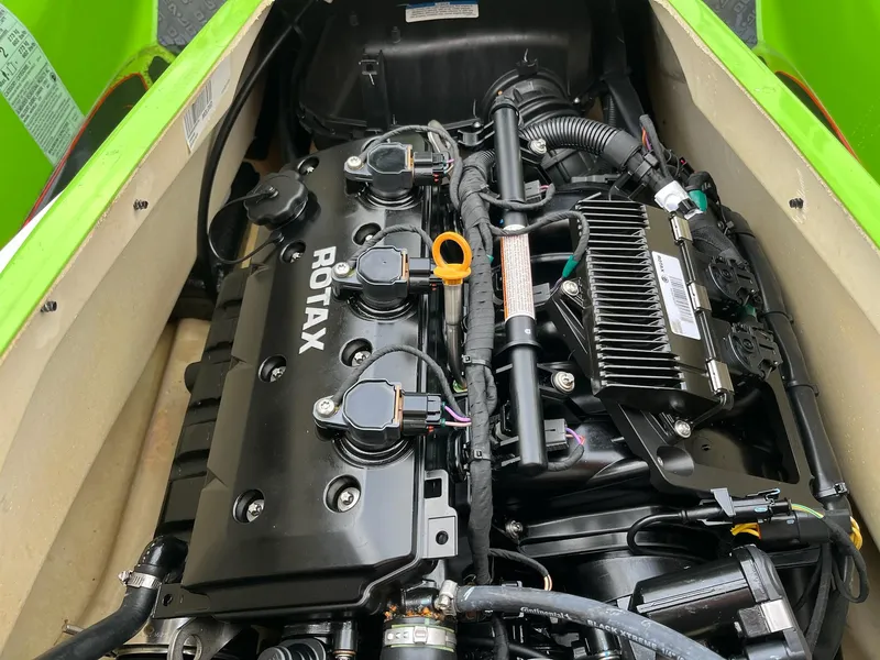 Slide: The Image of Engine compartment of a 2017 Bombardier Sea Doo GTR 230 with Rotax engine. - 29