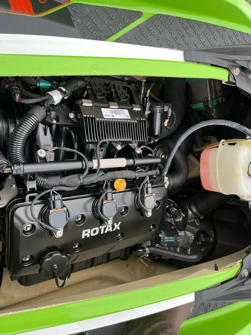 Slide: The Image of 2017 Bombardier Sea Doo GTR 230 engine compartment with visible Rotax components. - 32