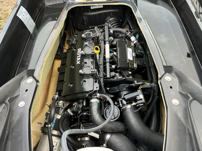 Slide: The Image of 2017 Bombardier Sea Doo GTR 230 engine compartment with Rotax engine components. - 33