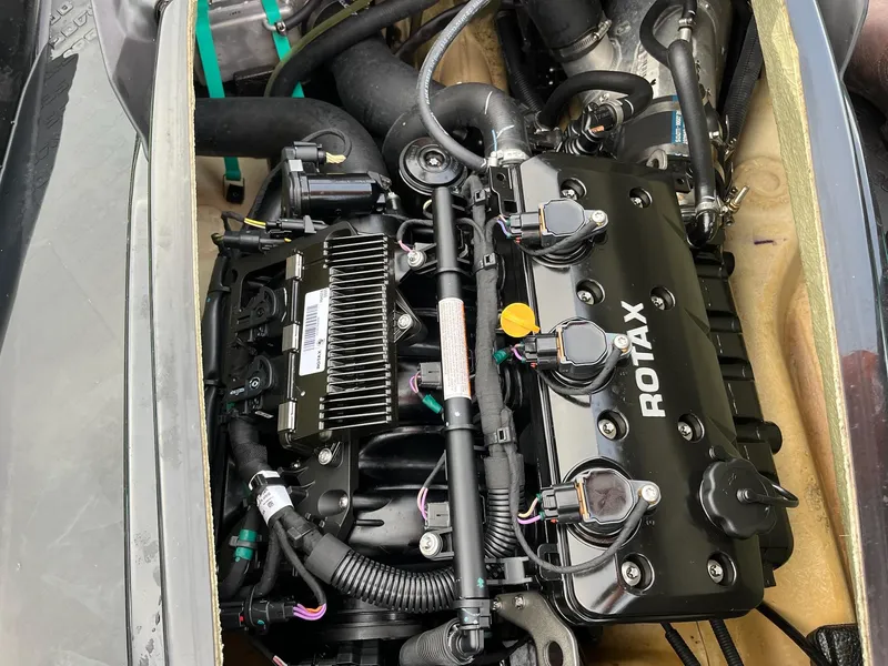 Slide: The Image of Engine of a 2017 Bombardier Sea Doo GTR 230, featuring a Rotax motor. - 36