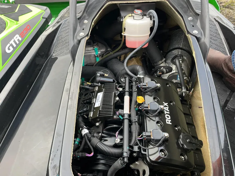 Slide: The Image of 2017 Bombardier Sea Doo GTR 230 engine compartment with Rotax engine visible. - 37