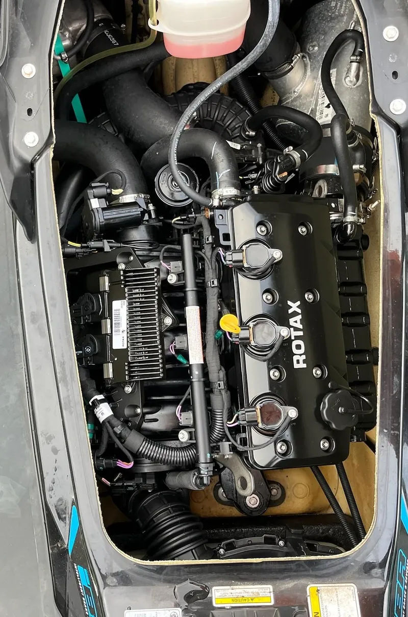 Slide: The Image of Engine of a 2017 Bombardier Sea Doo GTR 230, featuring a Rotax power unit. - 38