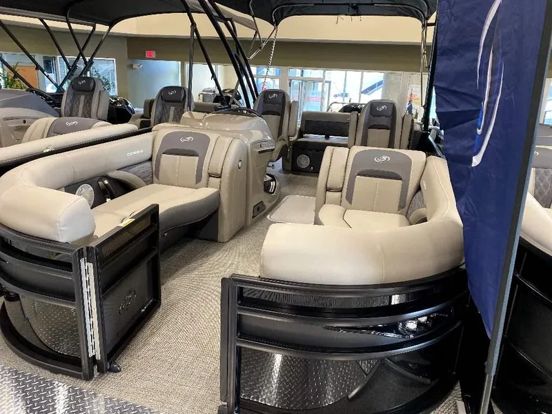 Slide: The Image of 2024 Barletta Corsa Ultra-Lounge 23UCA pontoon boat interior with luxurious seating. - 2