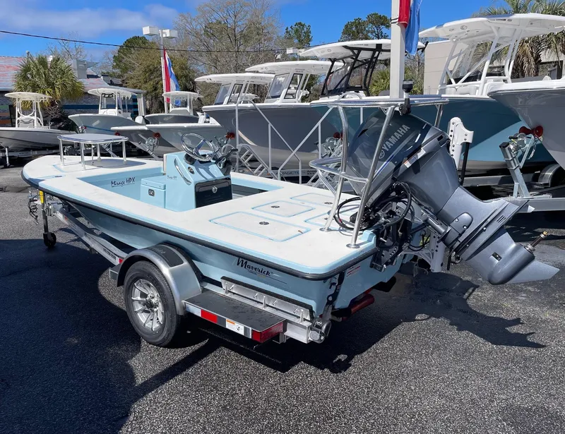 Slide: The Image of 2024 Maverick 17 HPX-V boat on trailer in outdoor showroom. - 4