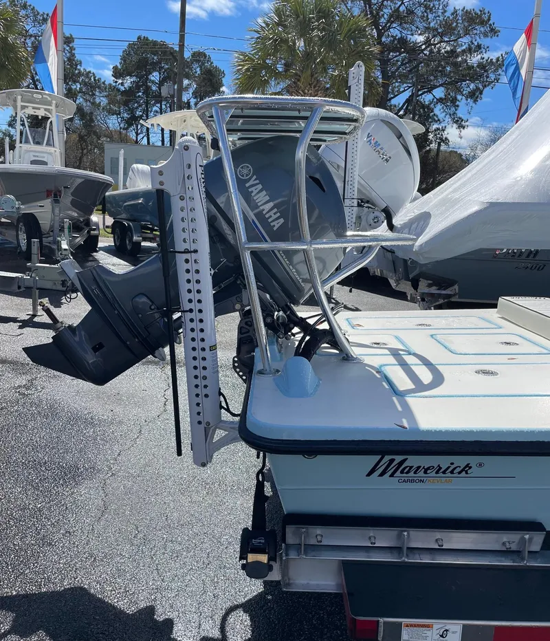 Slide: The Image of 2024 Maverick 17 HPX-V boat, rear view, parked on a trailer. - 6