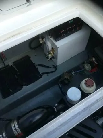 Slide: The Image of Engine compartment of 1996 Sea Ray 270 Sundancer Special Edition boat. - 7