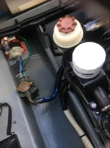 Slide: The Image of Engine compartment of a 1996 Sea Ray 270 Sundancer Special Edition boat. - 9