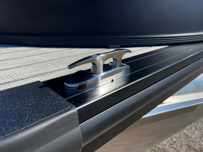 Slide: The Image of 2024 Harris Solstice 230 boat cleat on deck. - 35