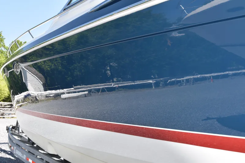 Slide: The Image of Port Side Hull Reflection in New Paint - 8